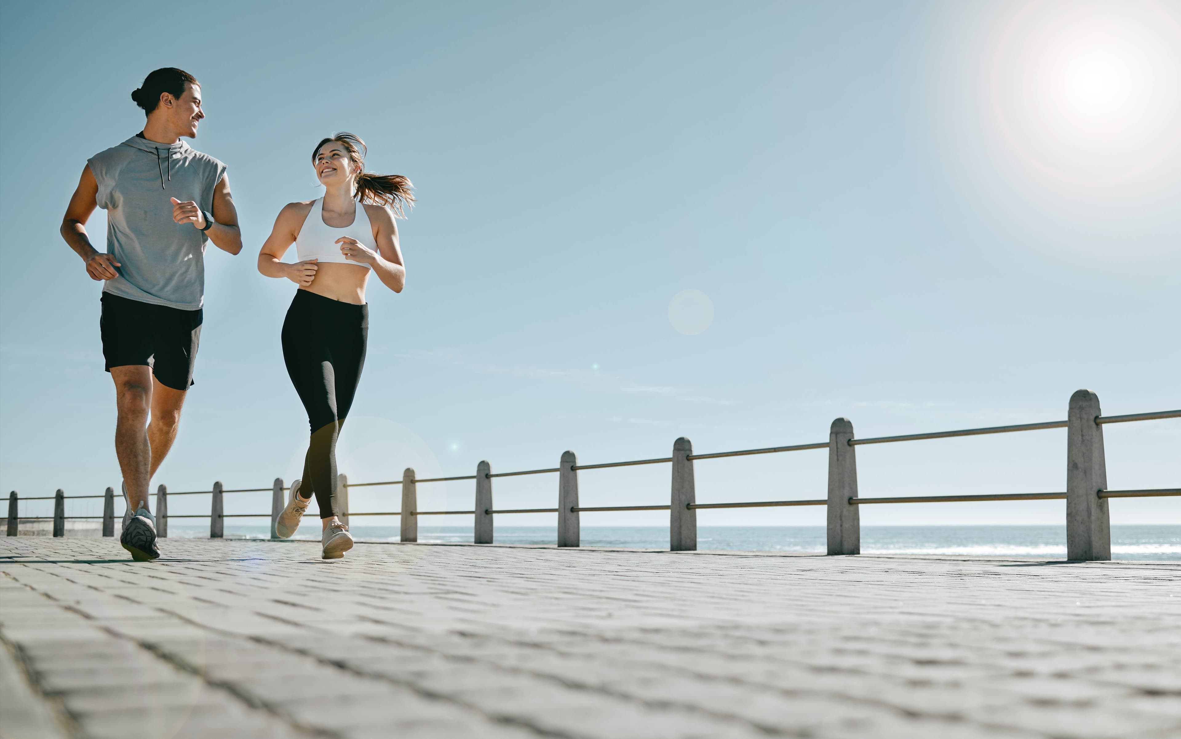 Athletic person silhouetted in a gym